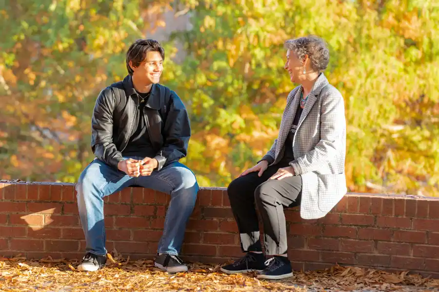 A professor and student in conversation